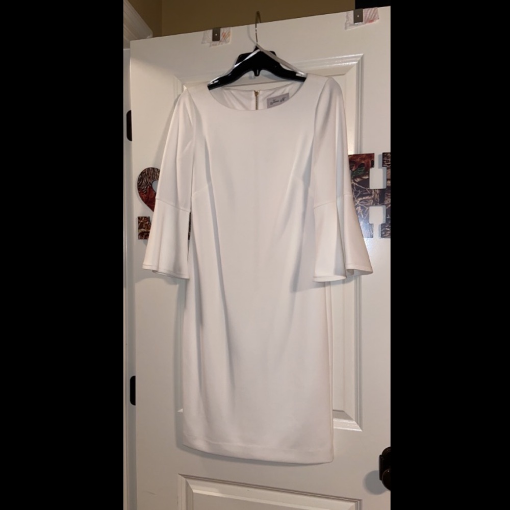 Short white dress with bell sleeves